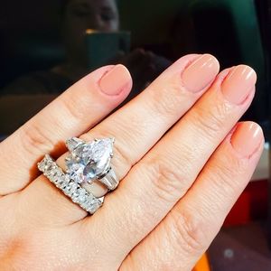 WOW! YOUR WEDDING SET IS GORGEOUS. Large SS CZ 2 piece solitaire/eternity band.